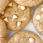 overhead view of vietnamese coffee flavoured cookies with white chocolate chips.