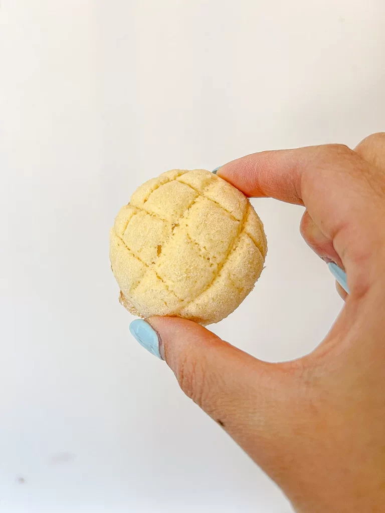 holding melon pan cookies